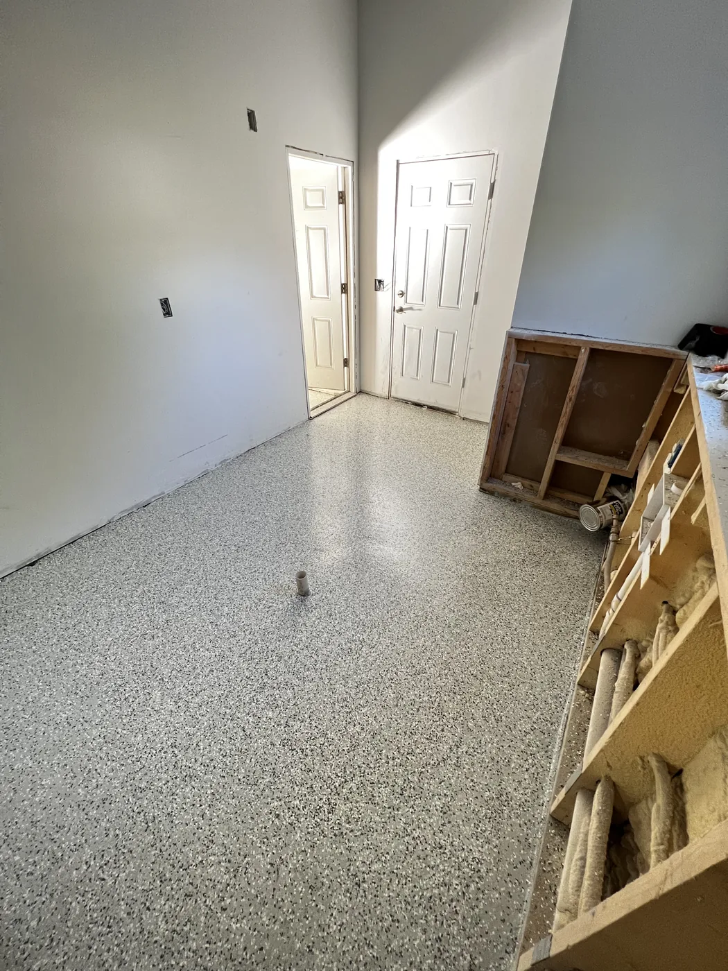 Decorative flake epoxy floor project by 1st Epoxy