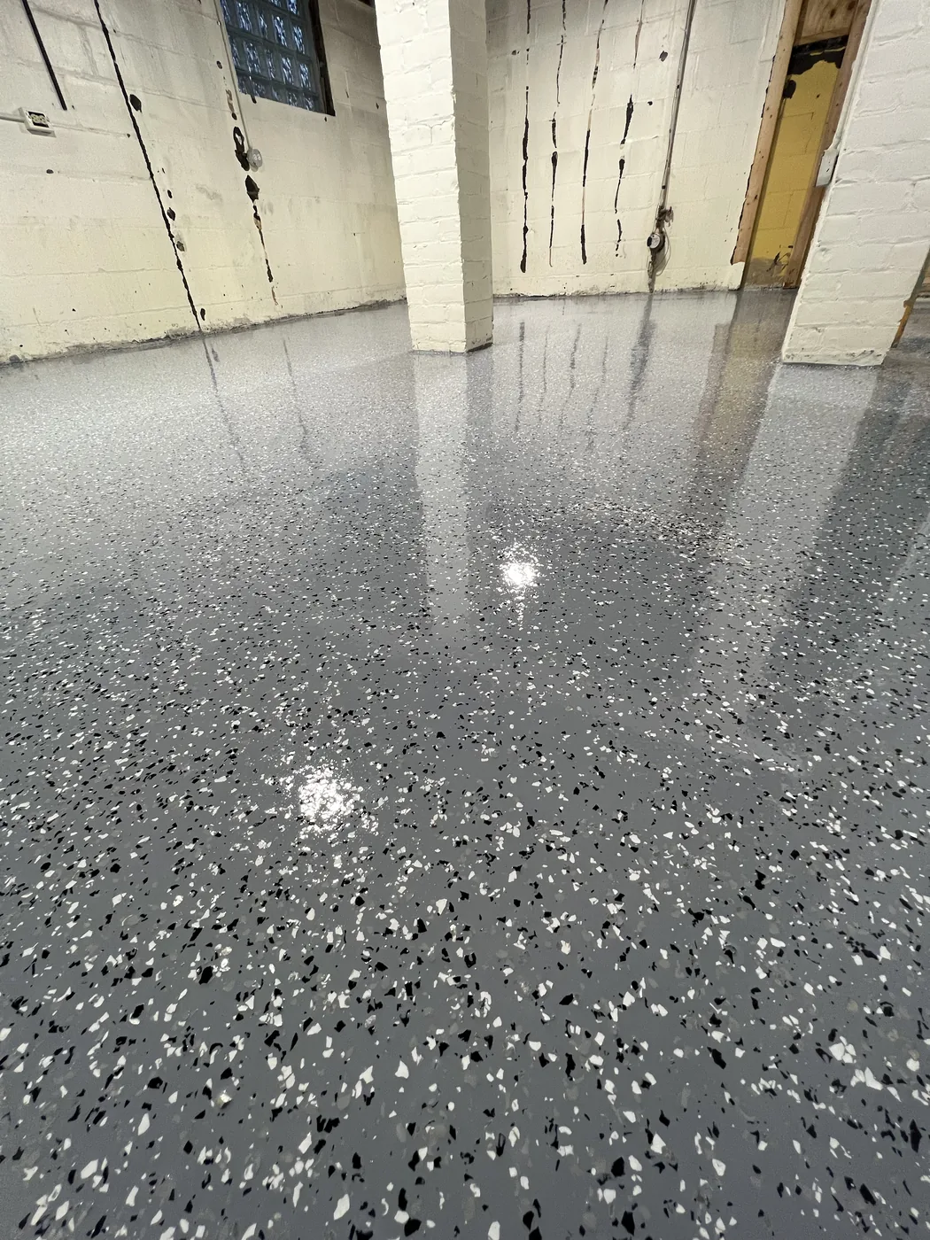 Decorative flake epoxy floor project by 1st Epoxy