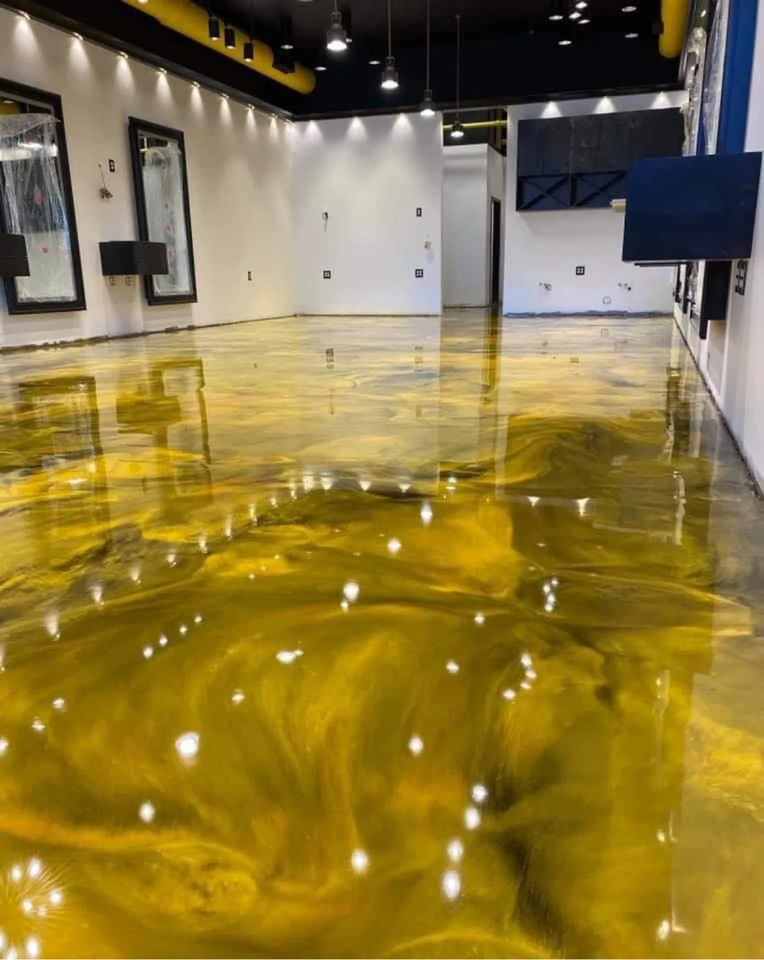 Decorative metallic epoxy floor project by 1st Epoxy